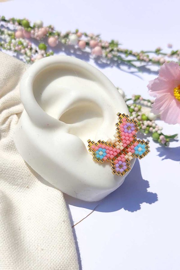 Topos mariposa rosadas