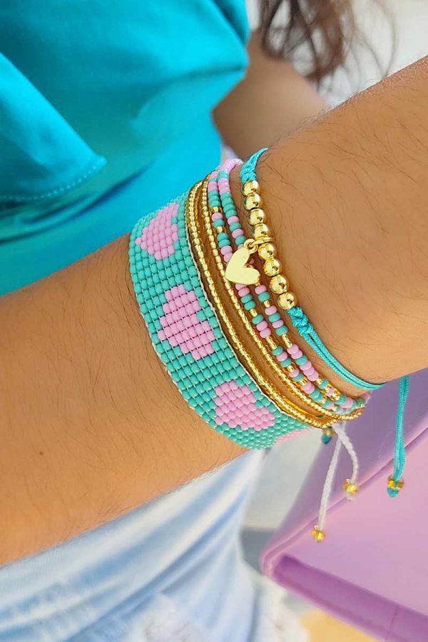 Set *7 pulseras corazones rosa menta covergold